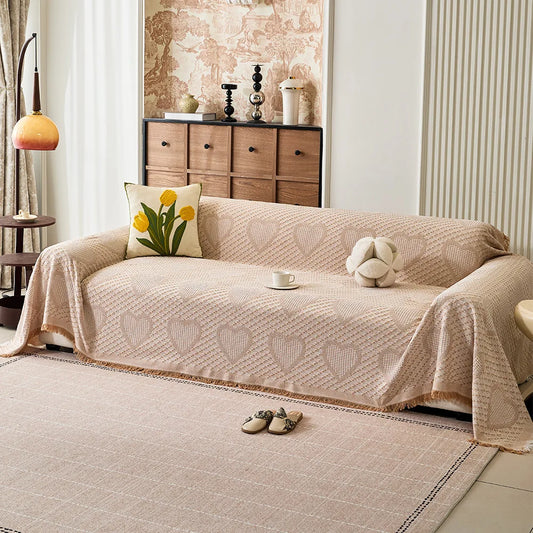 Jeté de canapé jacquard motif cœurs noir avec pompons