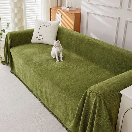 Jeté de canapé chenille chevrons vert foncé sur canapé d'angle