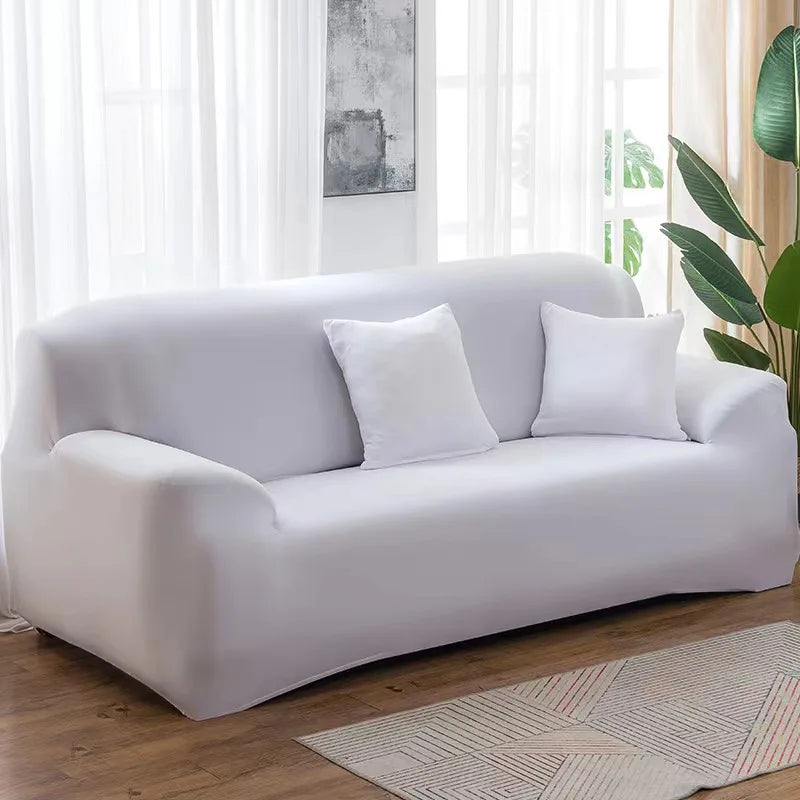 Housse de canapé extensible unie Bleu saphire 4 places 235-300cm - MaisonHousse