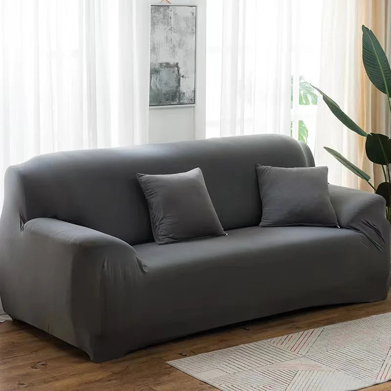 Housse de canapé extensible unie Bleu saphire 2 places 145-185cm - MaisonHousse